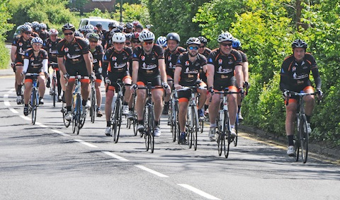 The cyclists on the Shalford Road on their way to the Weyside Inn in Guildford.