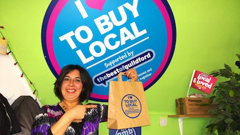 Sally Casto-Gouveia with one of the buy local bag of special offers.