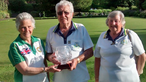 Jill Bird from Castle  Green Bowling Club hands over the Millennium Cup to Astolat Bowling Club captain Jim Longhurst, assisted by Margaret Neville.