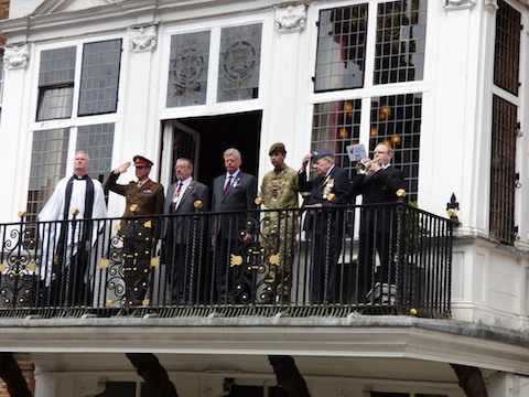 The gathering on the balcony of the Guildhall for the service before the flag raising.