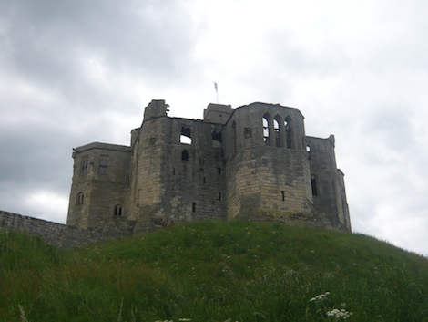The ruined castle that still dominates the High Street in the pretty village of Warkworth.