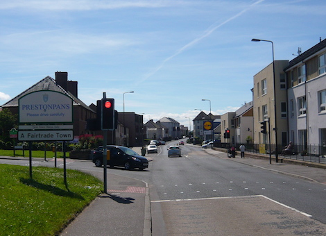 Prestonpans - I received a friendly wave from the man enjoying the sun on the right despite the towns history.