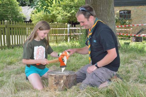 Tent peg making was just one of the activities at the scouting skills day. More details further on in article. Picture by Peter Stables.