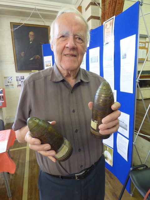 Ron McGill with the two Turkish shells he father brought back from the battlefield.