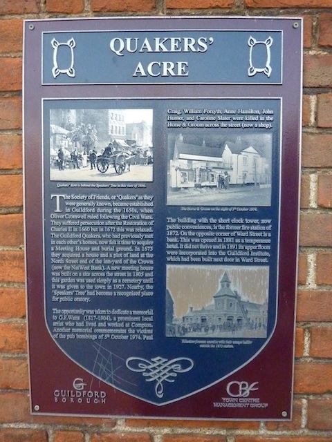 The plaque at the entrance to Quakers' Acres that gives details of the Guildford pub bombings.