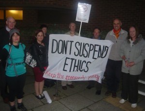 Protestors against the suspension of the council's sponsorship policy outside the council chamber at Millmead last night (September 30).