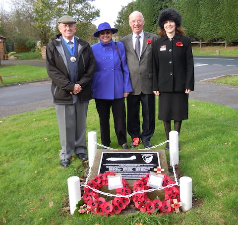 At the war memorial in Jacobs Well, from  left: Worplesdon parish chairman Dr Paul Cragg, parish assistant Ann McShee, Cllr Bob McShee and parish clerk Gaynor White.