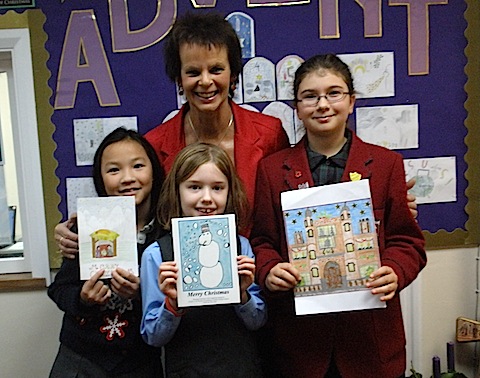 Guildford MP Anne Milton with Ines, Susana and Anastasia.