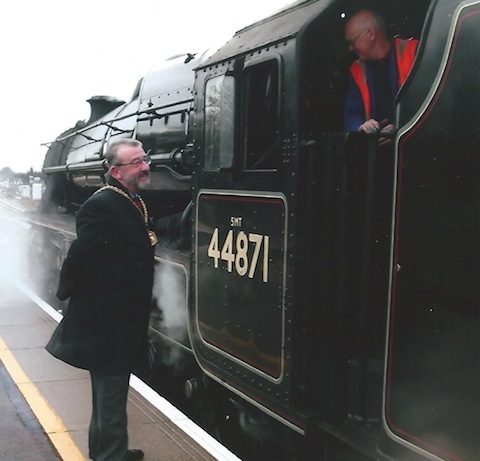 Can I have a go? The Mayor, David Elms, chats to the crew of the leading engine.