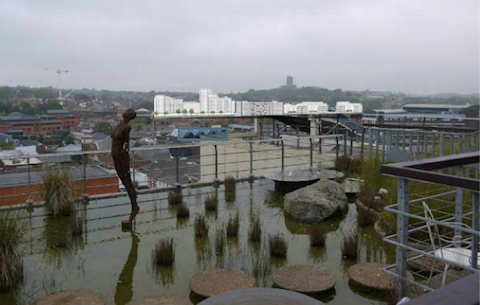 Image prepared by GSOC Limited for illustrative purposes only to show the potential impact of the proposed Solum development of Guildford railway station on the views from the Jellicoe Roof Garden on top of the House of Fraser store in the High Street.