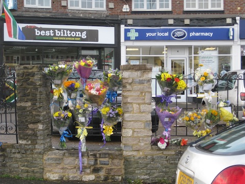 Floral tributes near the spot where the altercation took place near the junction of Aldershot Road, Worplesdon Road and Woodbridge Hill.