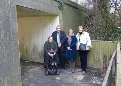 Pictured from left: Park Barn residents Deanna and Mike Davis, who are delighted the flooding problems of the underass have been resolved, with Guildford borough councillor Julia McShane and Surrey county councillor Fiona White.