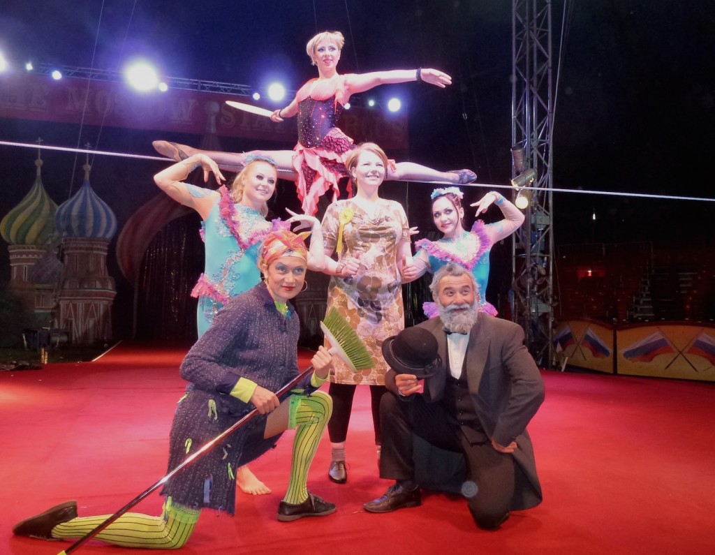 Kelly Marie posing with members of the circus troupe. 