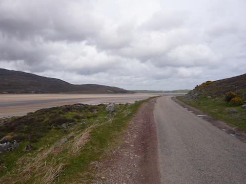 The road ran alongside the Kyle of Durness with its wide stretches of sand.