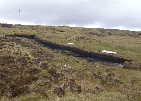 Signs of peat cutting for fuel. Crofters still have the right to take peat in these parts.