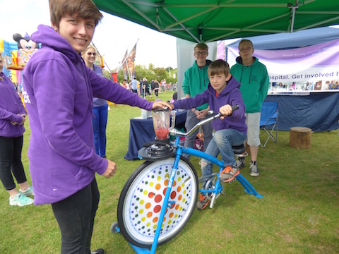 Trying out Guildford Play Rangers' smoothy bike.