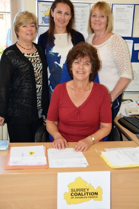 The Surrey Coalition of Disabled People Team, at their Astolat offices in Burpham. Alison White Events Coordinator, Sylwia Squires PA to Carol Pearson, Sue Peryy, Admin and Finance, Carol Pearson, Chief Executive (seated Centre) 