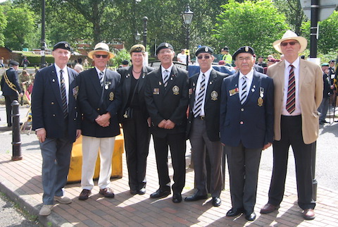 A group of Queen's Regiment veterans who took part in the parade pictured at Millmead before the parade. Roger Atkinson is pictured second from right. Picture by Sheila Atkinson.