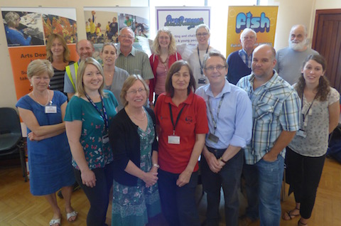 Community warden Tracy James (centre) with some of those who attended the Grassroots Marketplace on Thursday, June 18.