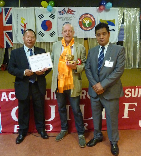 From left: the chairman of the Sunrise Gurkha Sports Club, Budhi Gurung; David Rose and the club's managing director Navaraj Ghale.