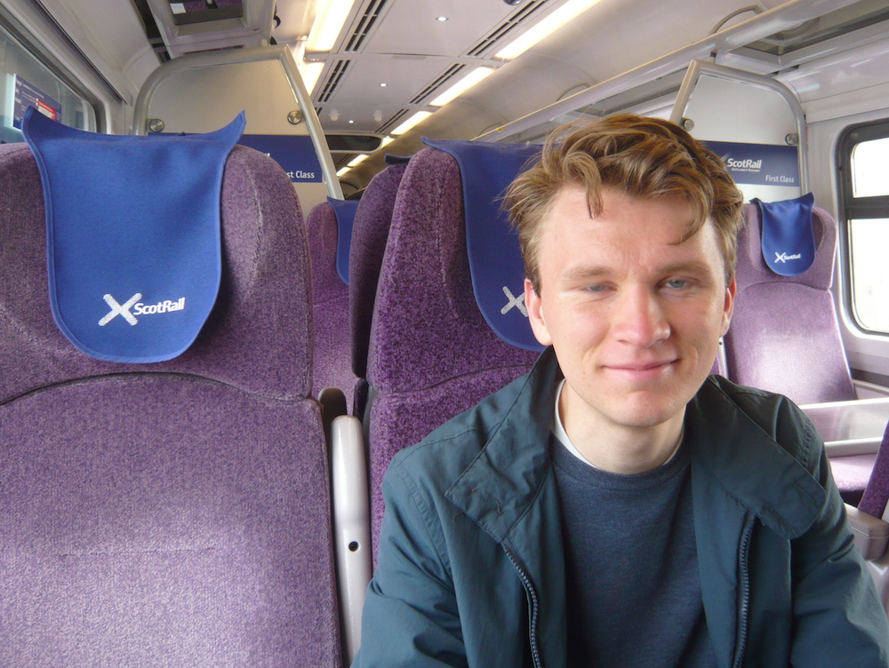 Tom looks tired but he was travelling for four hours, "first class" for around £8.50 (with young person card discount).