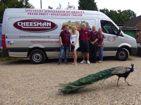 Some of the Cheesman Bros team: From left: Dave Sturgess, Clare Din, Martin Cheesman, xx and xx, with one of their peacocks strutting by!