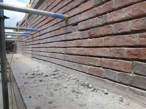 Brickwork on the parapet wall.