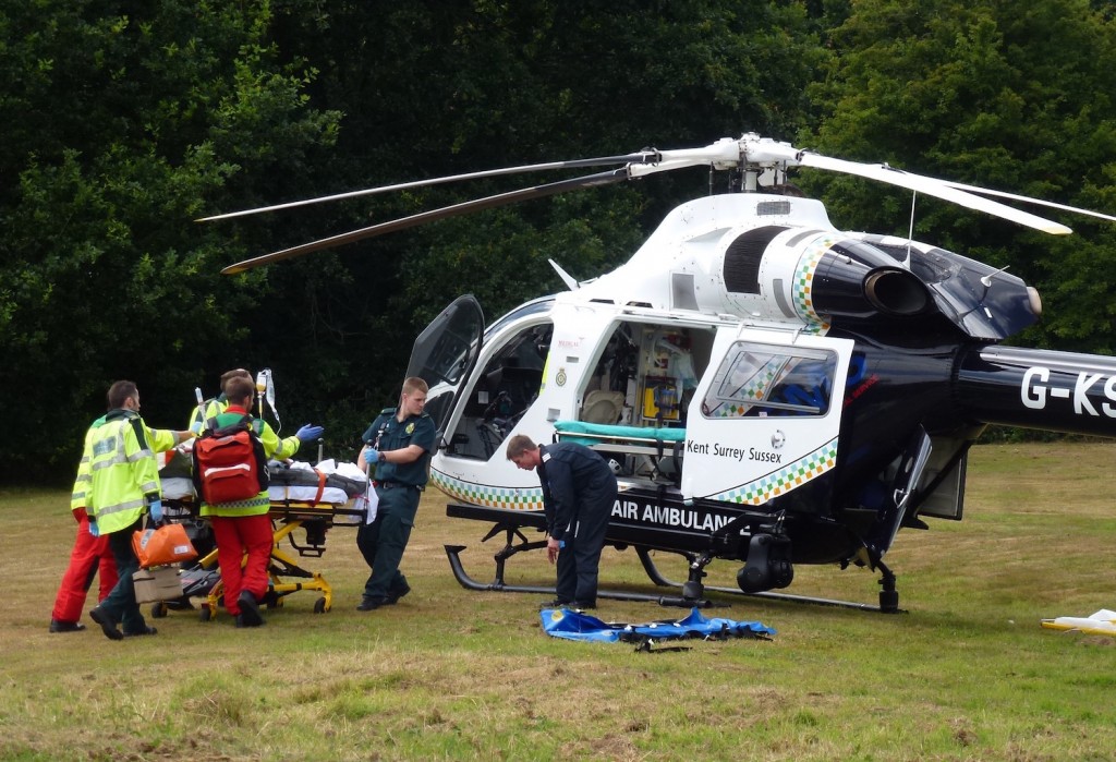 The casualty is taken to the waiting air-ambulance.