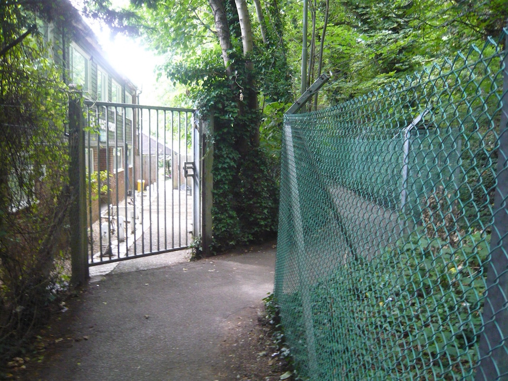 The Alley that runs from Woodbridge Road to Woodbridge meadow behind the Sea Cadets hut on the left.