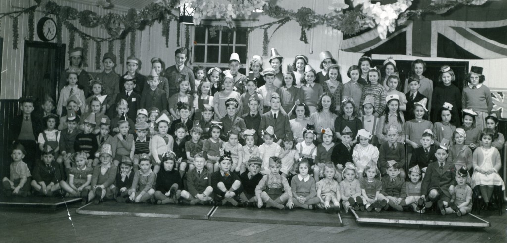 Children's Christmas party sometime between 1945-56. Anyone look familiar?
