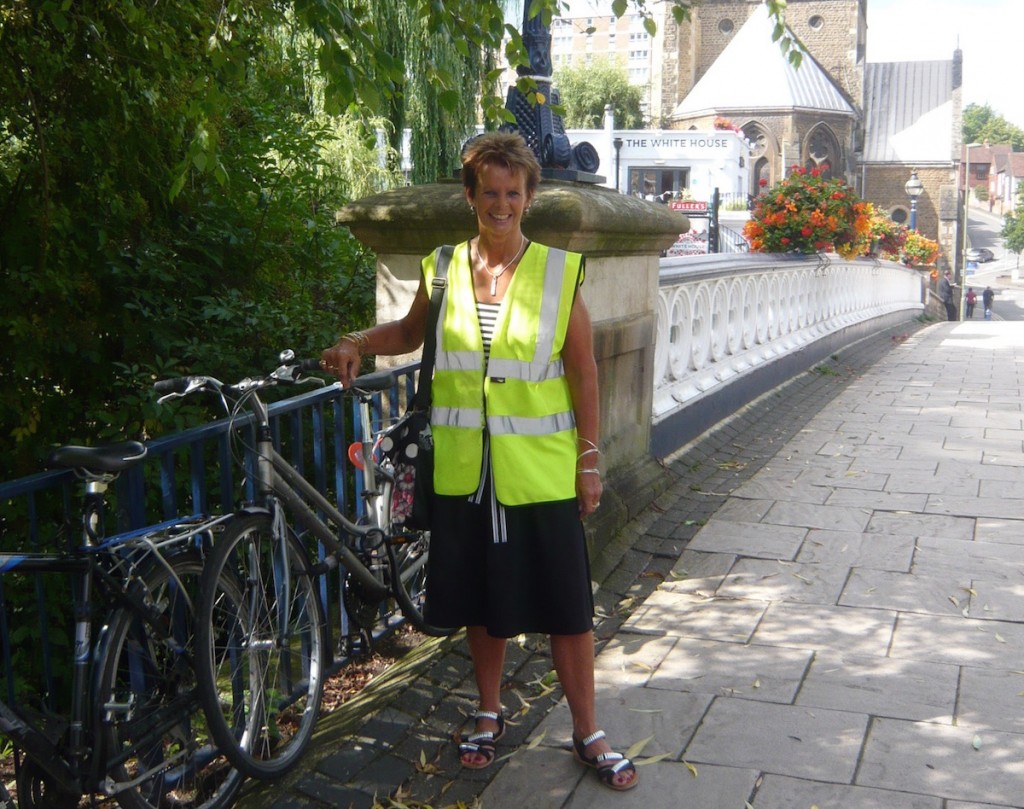 Anne Milton, here pictured with her bike on the Town Bridge, is a regular cyclist in Guildford.