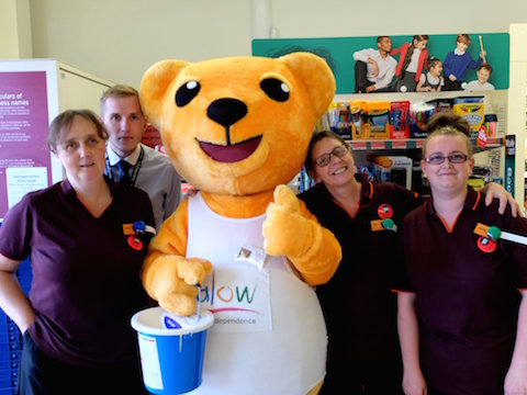 The halow mascot Hector, with staff from Sainsbury's in Worplesdon Road, Stoughton, Guildford.