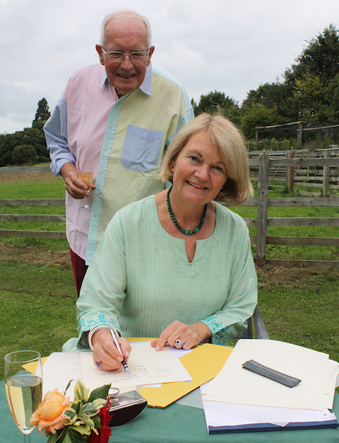 Susan and Malcolm Brenton sign the lease for the Wey & Arun Canal Trust to re-construct 400 metres of the waterway on their land at Bramley.