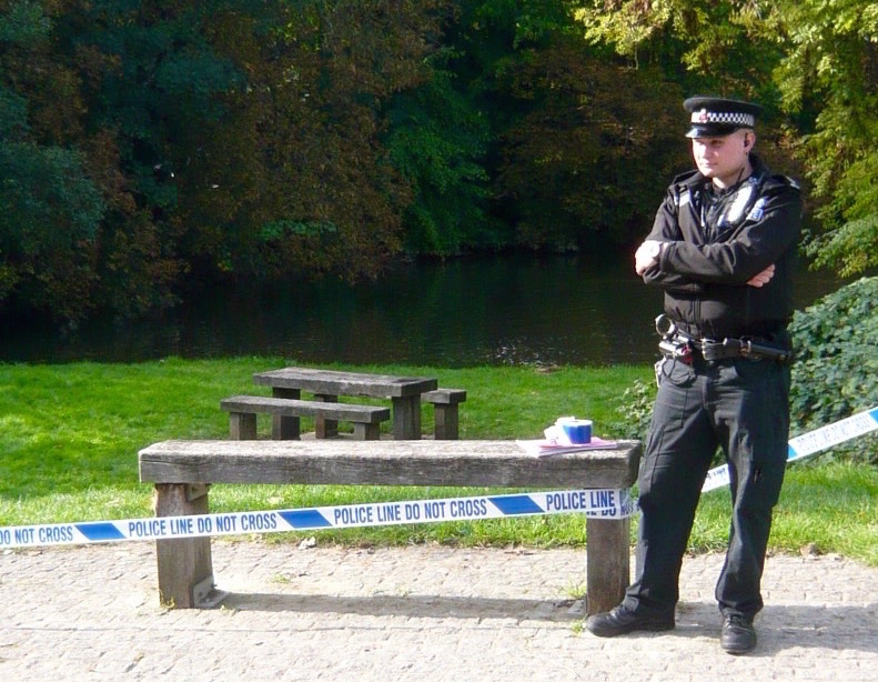 A police officer on Sunday (Oct 11) guarding the scene of the sexual assault on Millmead Island, Guildford.