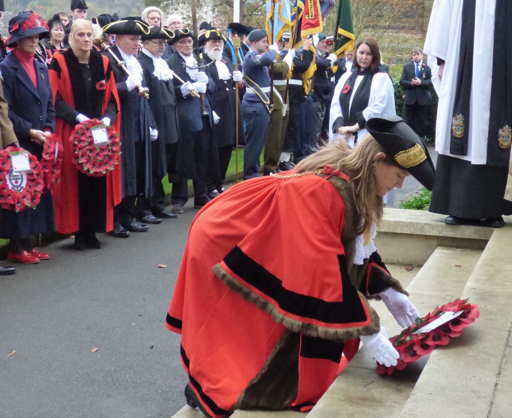 The Mayor, Cllr Nikki Nelson-Smith laying a poppy wreath at Guildford War Memorial today.