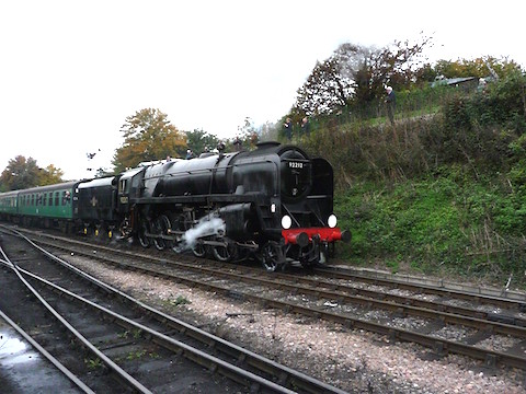 9F loco departing Ropley.