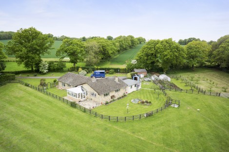 Brooklands in Bramley - Spacious bungalow set centrally to six acres, with equestrian facillities.