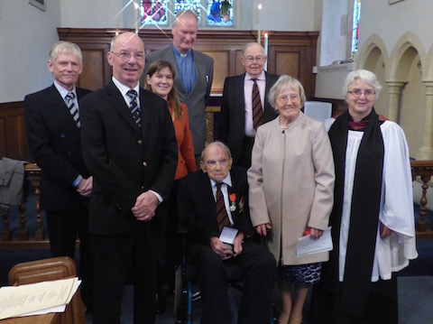 Mr and Mrs Mitchell pictured with the mayor, Cllr Bob McShee, the revd Hugh Grear, the revd Anne Payne, Ian Chafield (past curator of the Surrey Infantry Museum) and 