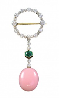Art Deco brooch set with diamond emerald and conch pearl, sold for £9,400