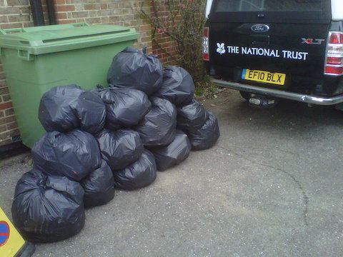 Bags of rubbish after a clean-up along the River Wey Navigations.