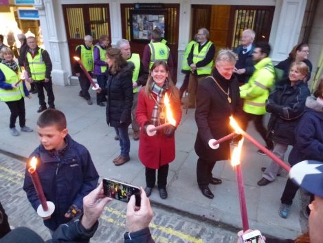Torches provided by the Guildford Lions Club were lit up outside of the Guildhall. The torches which came from Germany, were made from a high quality wax.