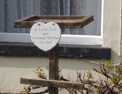 This sign is also in front of the same cottage.