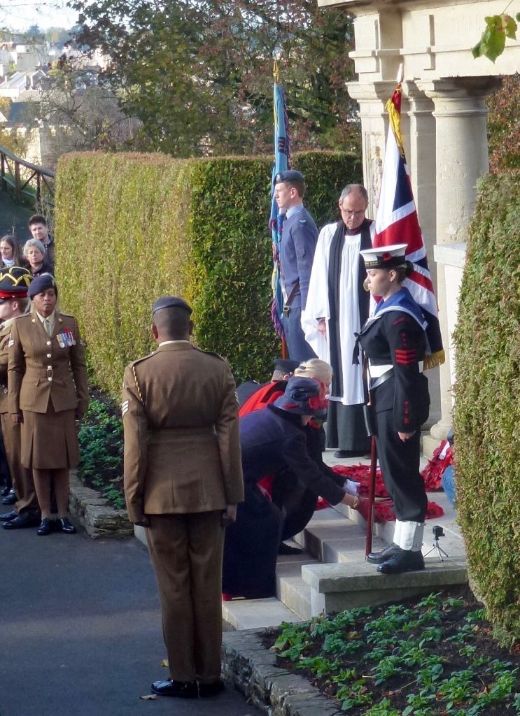 Wreaths being laid by the Rt Hon Anne Milton MP and Sue Sturgeon, managing director of Guildford Borough Council.