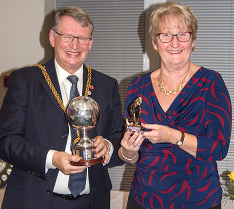 The Mayor of Guildford, Gordon Jackson, presents Lynn xx with the champion of champions cup.